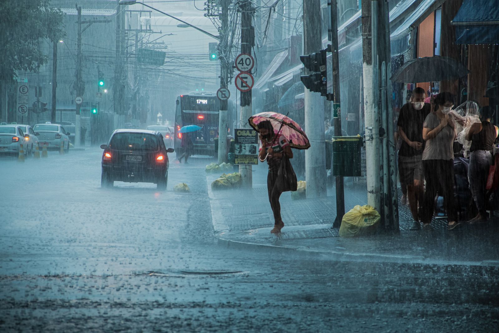Busy street during a heavy downpour