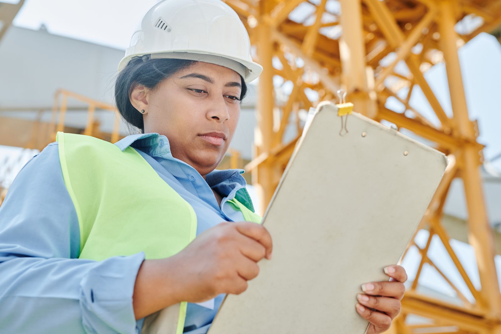 Field inspector working through a damage checklist on site